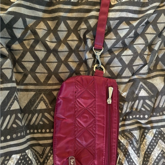 Lug Red Quilted Wristlet Clutch with waterproof interior. - Picture 2 of 5